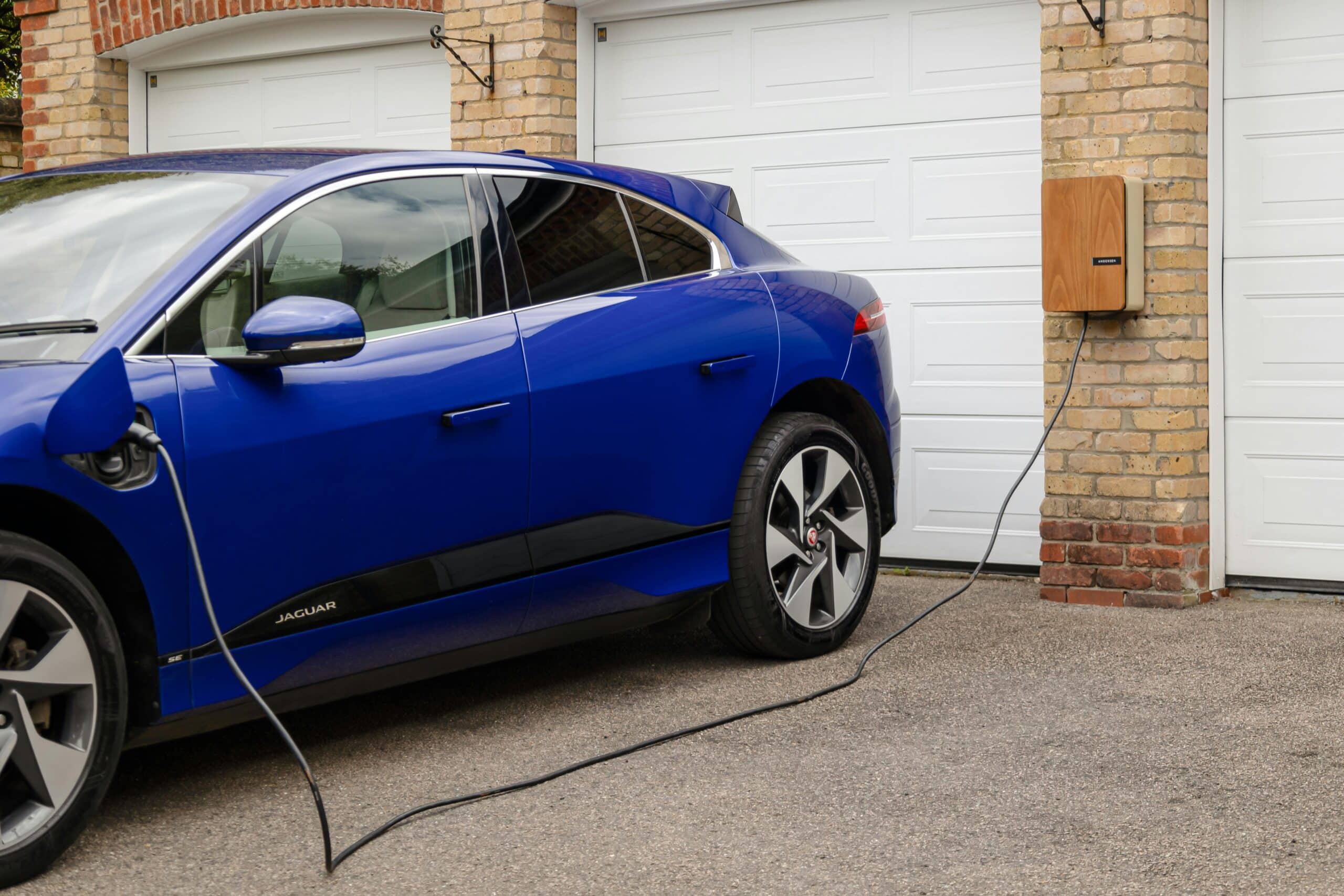 EV is charging at garage .