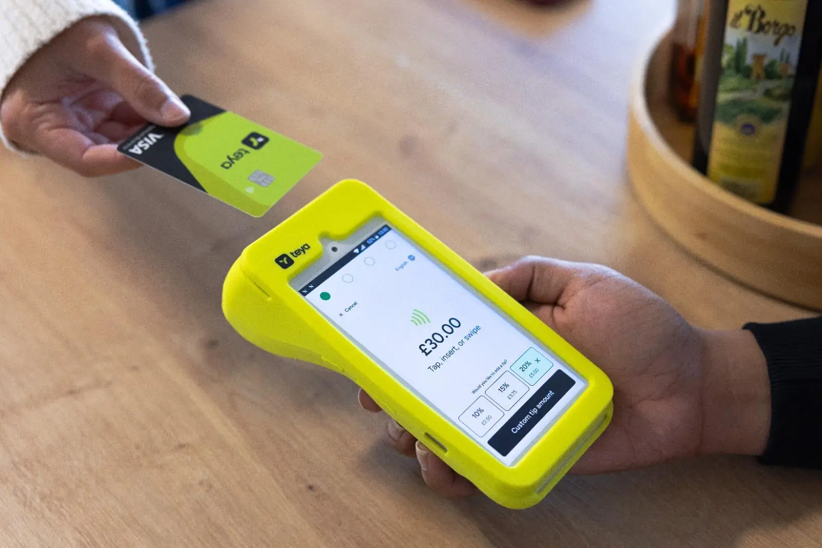 Contactless payment being made with a card.